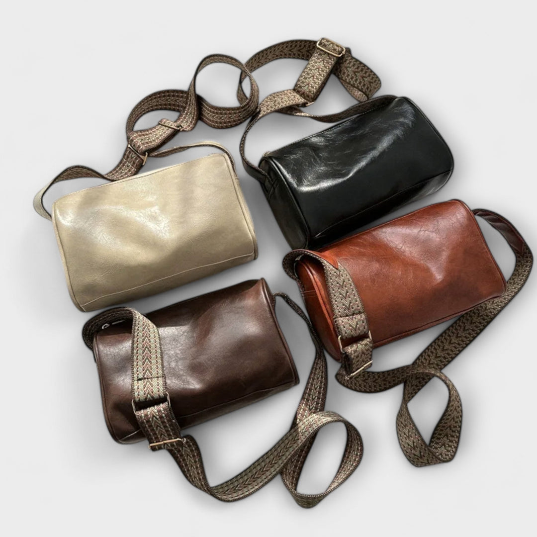 Everyday fashion bag for women featuring a trendy patterned strap and gold hardware.