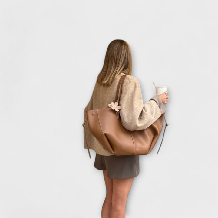 Chic and compact women's crossbody handbag in contemporary grey, ideal for daily essentials