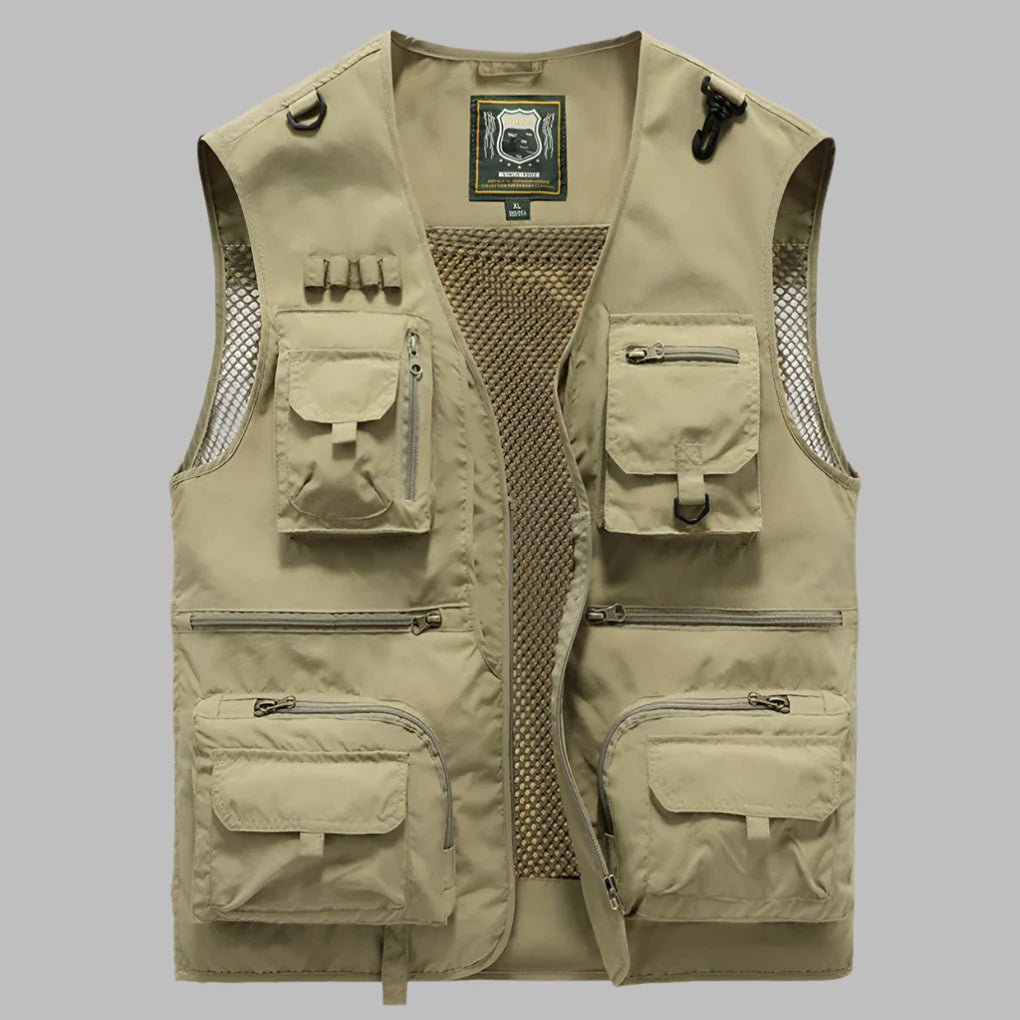 Water-resistant women's utility vest with many pockets, suitable for outdoor activities.