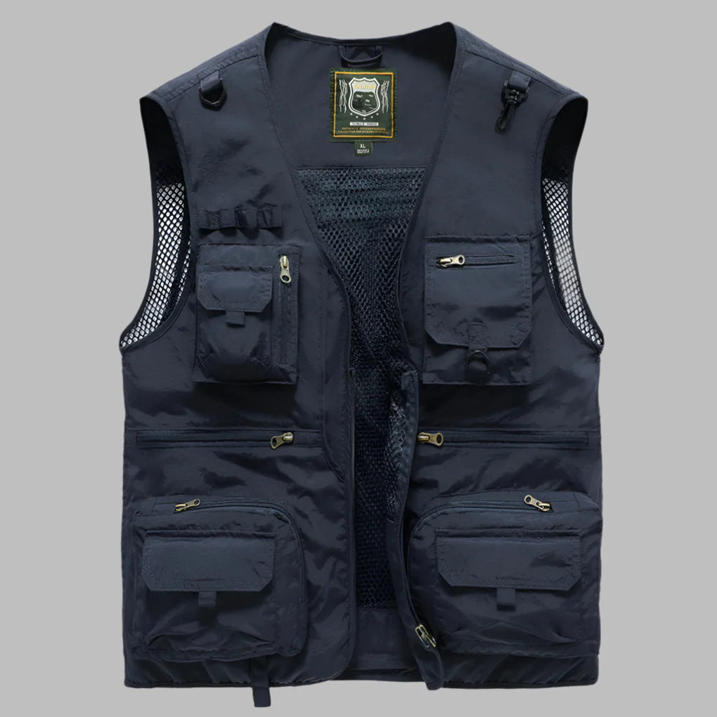 Women's multi-pocket outdoor vest in a neutral color, styled for summer travel apparel.