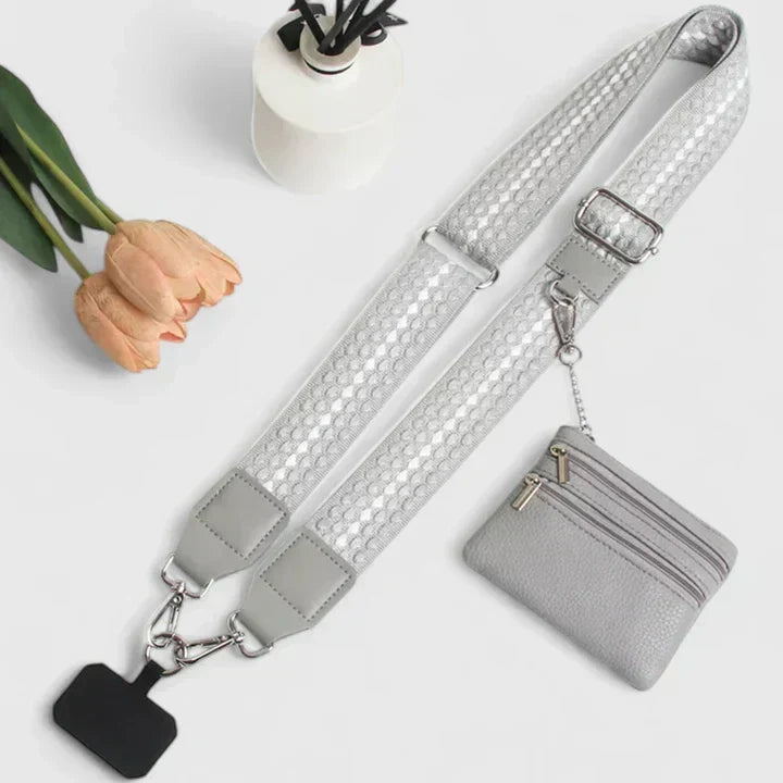 Women's multi-pouch crossbody phone bag in black, perfect for compact and secure phone carrying.