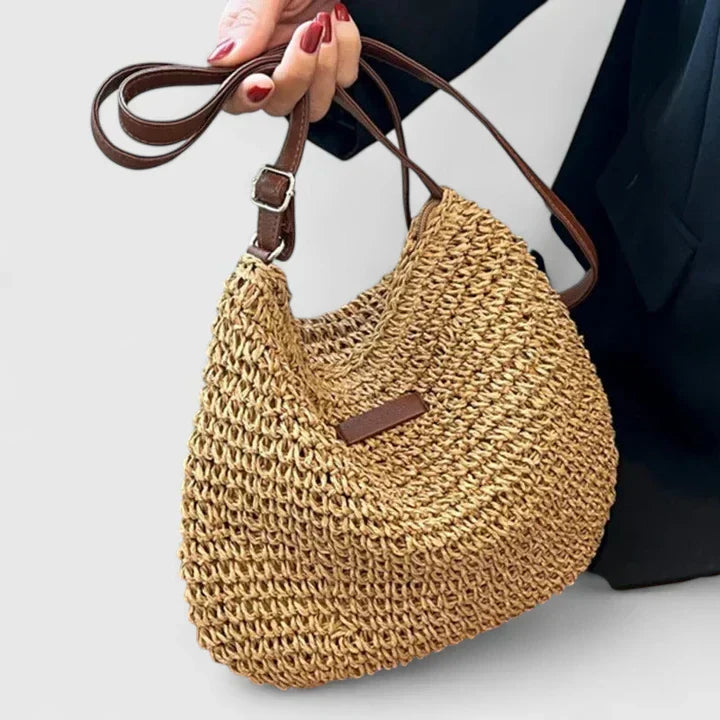 Casual women's shoulder bag in natural beige, features a textured design for versatile summer fashion.