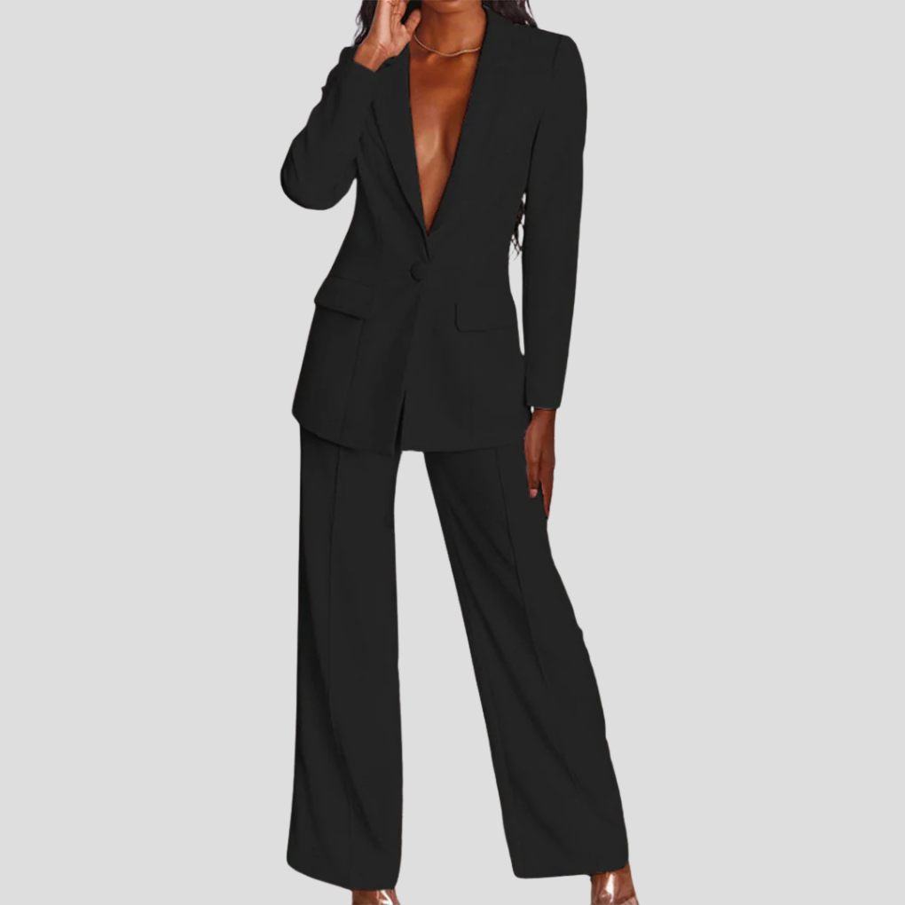 Detail of women's blazer lapel & straight-leg trouser waistband, illustrating quality tailoring.