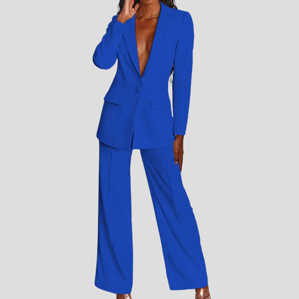 Professional women's purple blazer and straight-leg trouser set, representing modern business attire.