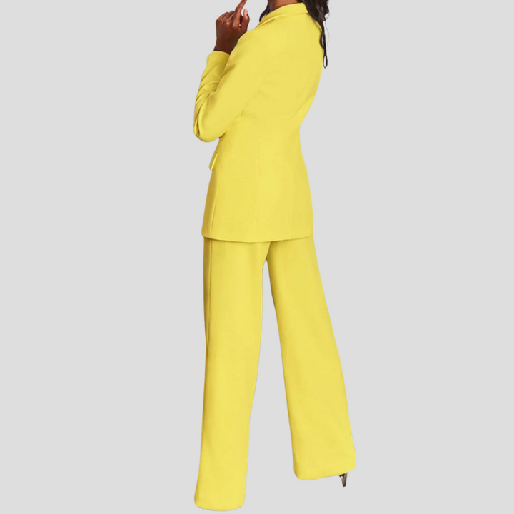 Stylish women's black formal blazer & straight-leg trouser suit for office or events, studio shot.