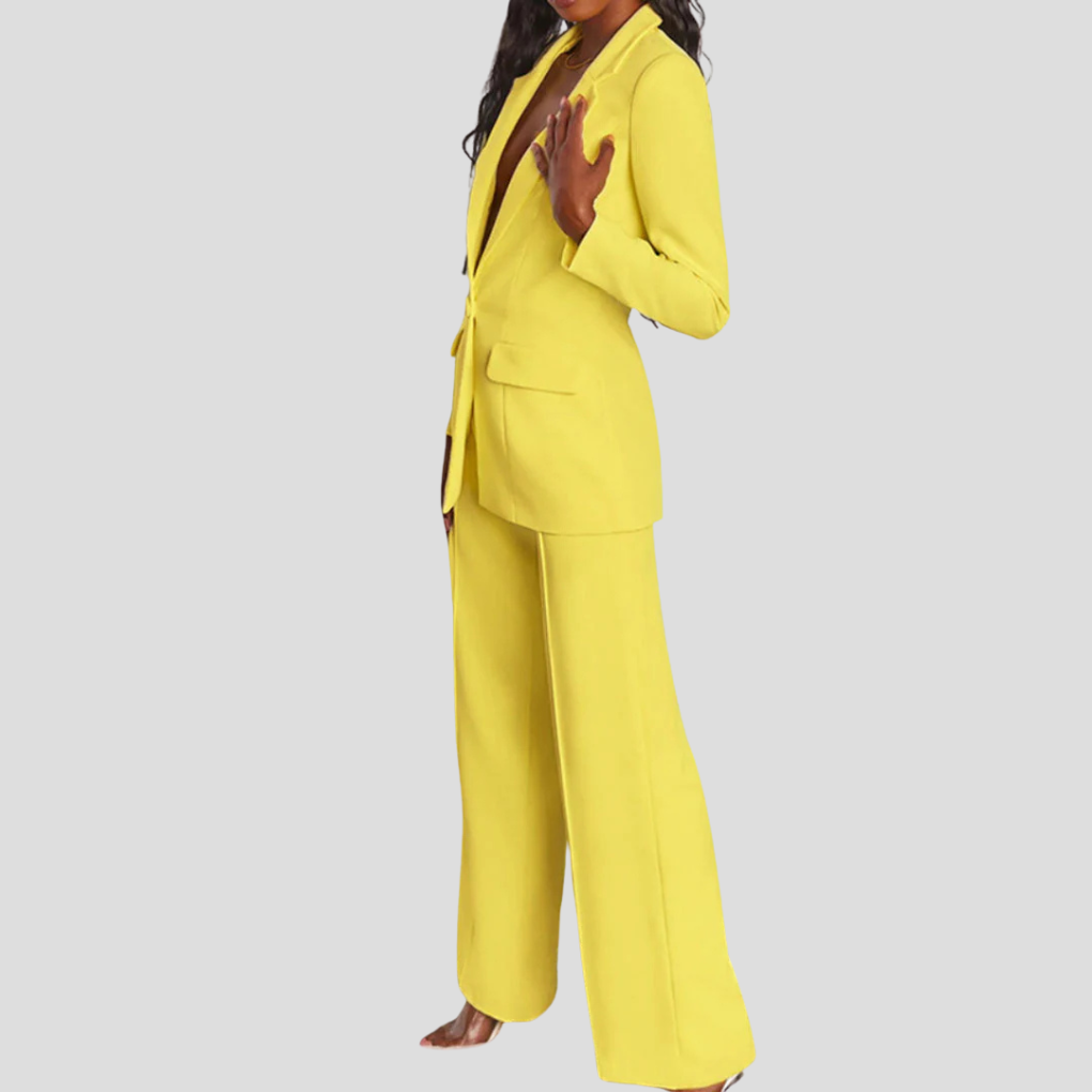 Elegant women's beige trouser suit with single-button blazer, ideal for business attire, full length.