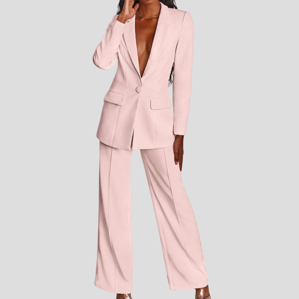 Close-up of women's co-ord set fabric, tailored blazer & straight-leg trousers, high-quality material.