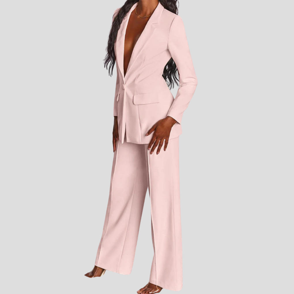 Women's contemporary green blazer & straight-leg trousers ensemble, versatile professional outfit.