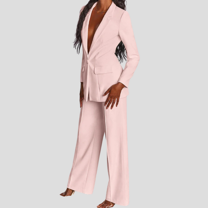 Women's contemporary green blazer & straight-leg trousers ensemble, versatile professional outfit.
