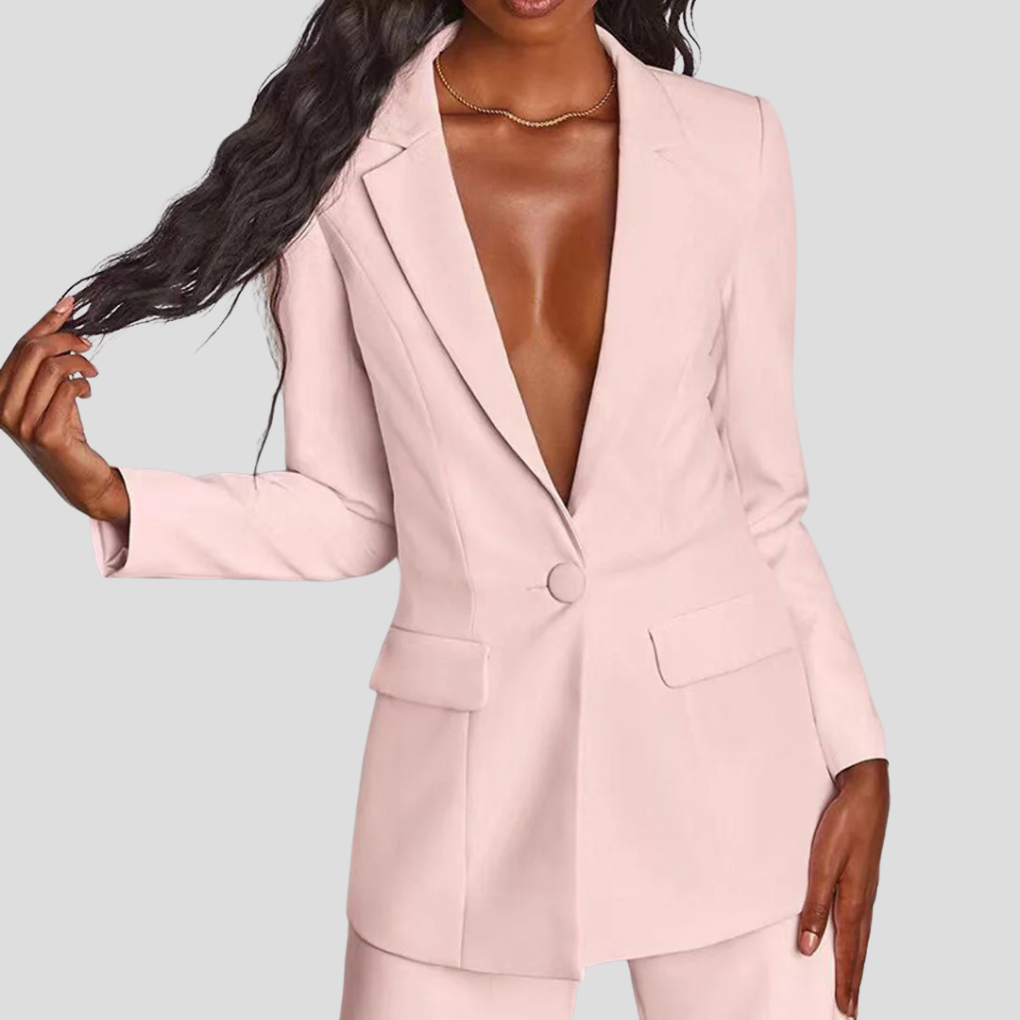 Side view of women's tailored blazer & straight-leg trousers co-ord set, showcasing silhouette.