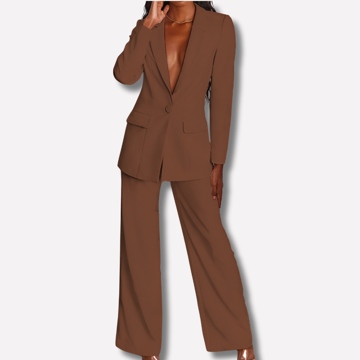 Women's professional attire: burgundy blazer and straight-leg trouser set, chic formal fashion.