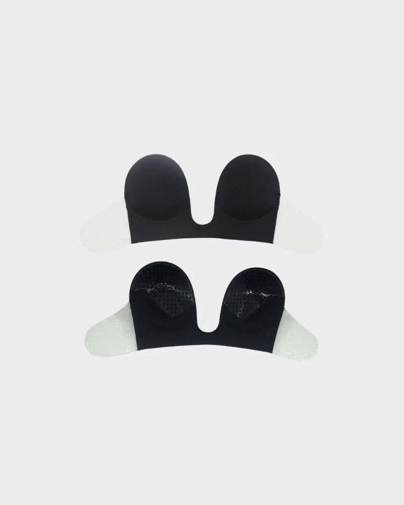 Black strapless backless push-up bra. Deep-U plunge adhesive design, perfect invisible women's intimate wear.