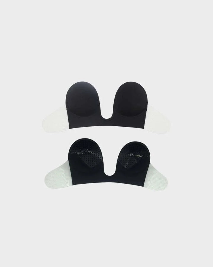 Black strapless backless push-up bra. Deep-U plunge adhesive design, perfect invisible women's intimate wear.