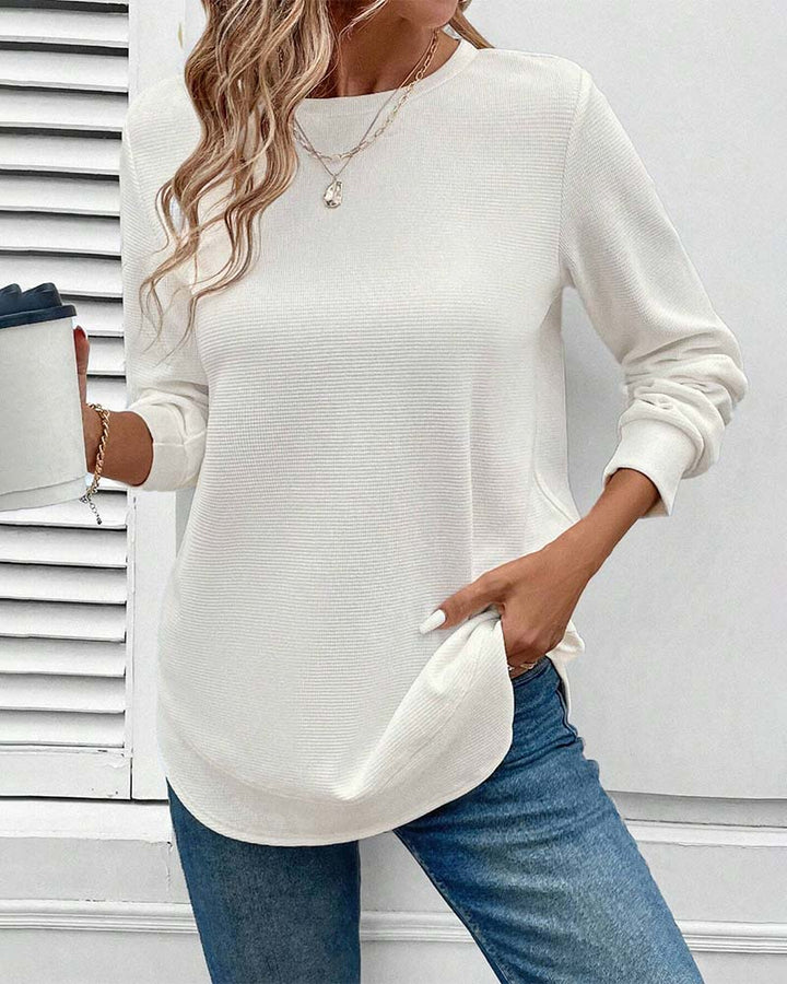 Soft cotton blend O-neck long sleeve top for women in a pastel pink, a stylish casual wear option.