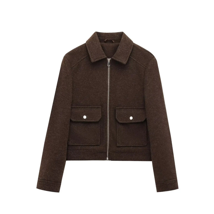 Model wearing a beige cropped zip-up utility jacket for women, side view, lightweight spring/fall outerwear