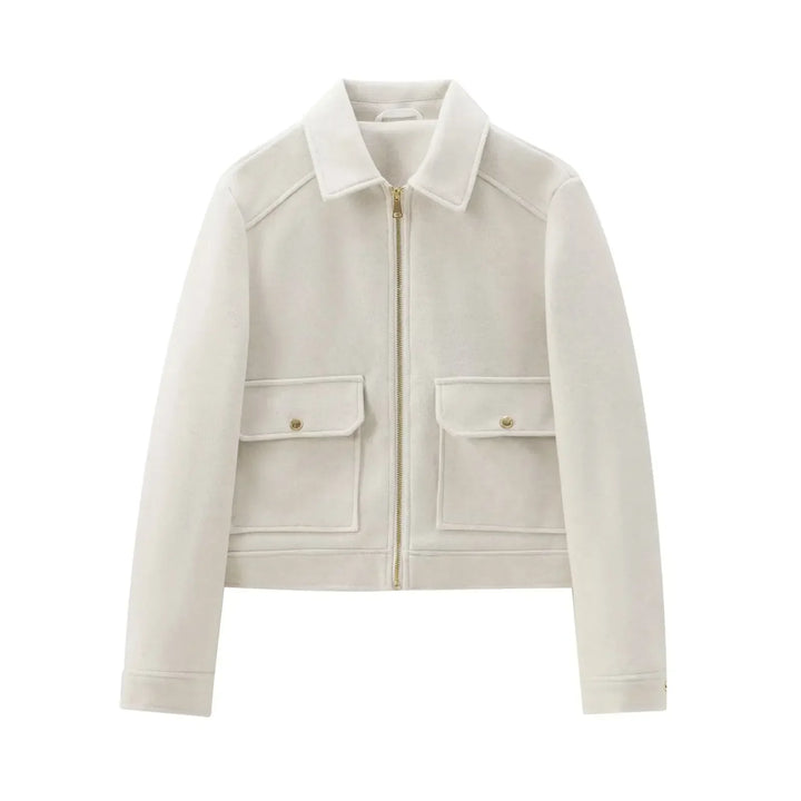 Hanging display of a women's grey utility cropped zip-up jacket, versatile fashion outerwear for daily wear