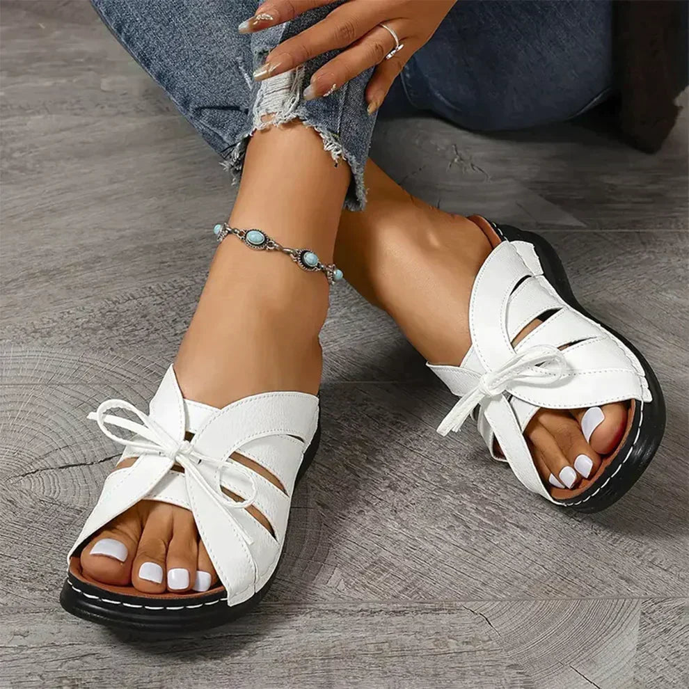 Versatile women's open-toe wedge sandals, knot detail. Great for casual & everyday summer fashion.