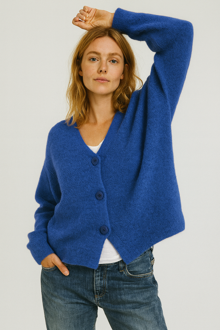 Dark green long-sleeve women's knit button front cardigan, a versatile spring sweater.