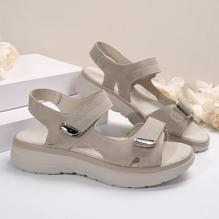 Women's orthopaedic sandals featuring an ergonomic sole and easily adjustable hook-and-loop straps.
