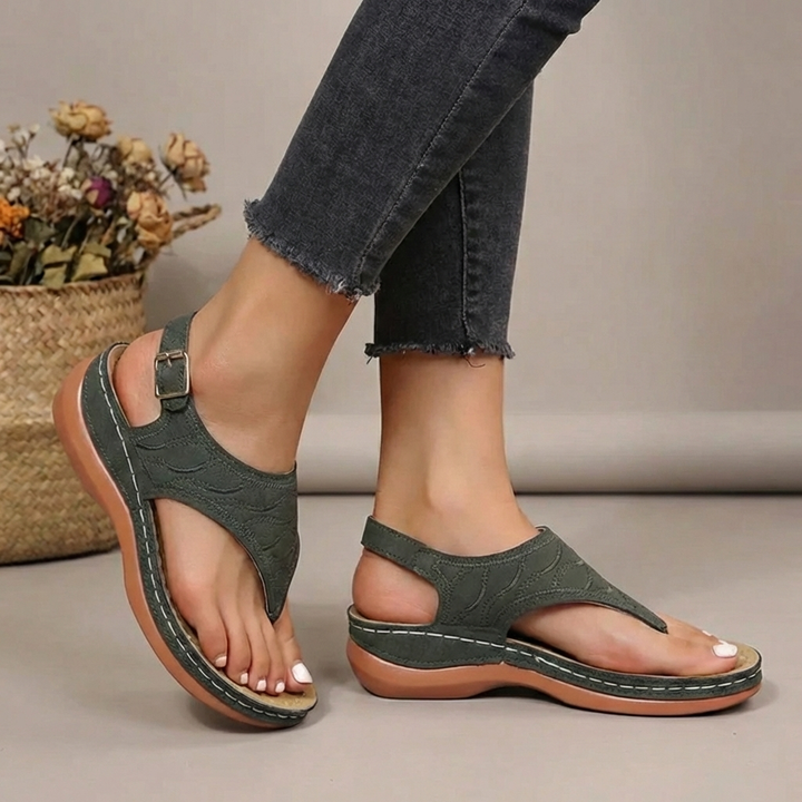 Women's orthopaedic thong sandals with arch support and adjustable strap for comfortable summer daily wear.