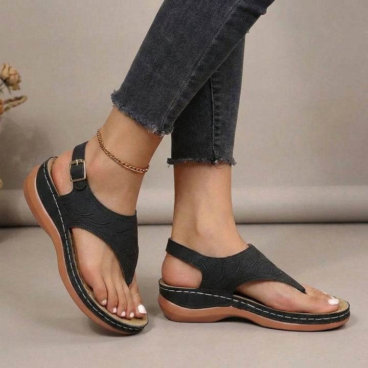 Comfortable women's thong sandals with orthopaedic arch support, great for foot pain relief & daily wear.