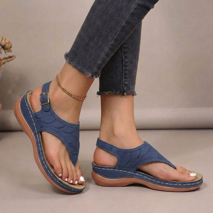 Orthopaedic women's thong sandals with essential arch support and an adjustable strap for all-day comfort.
