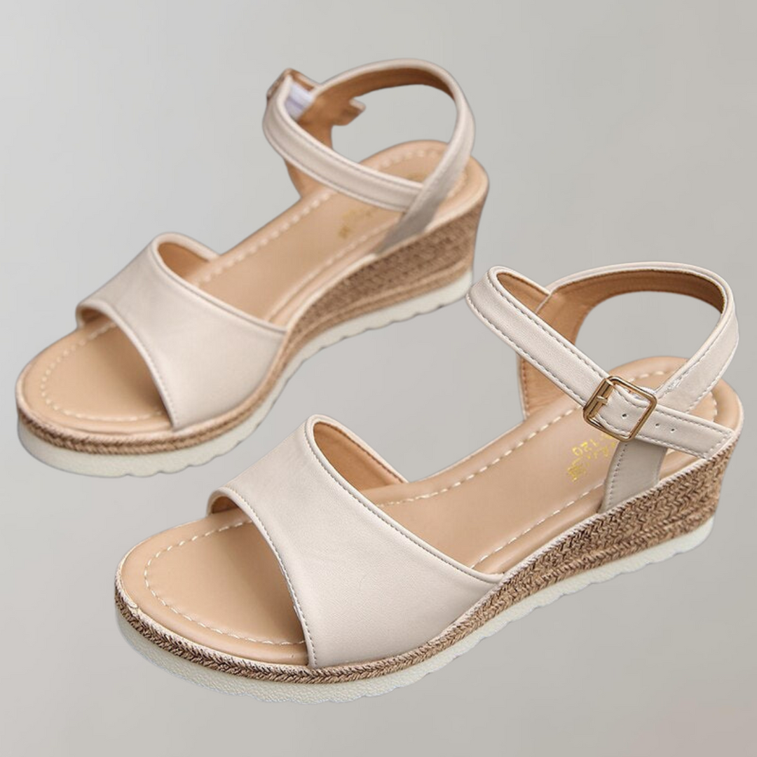 Women's casual summer wedge sandals with orthopaedic arch support and easy-to-adjust comfort straps.