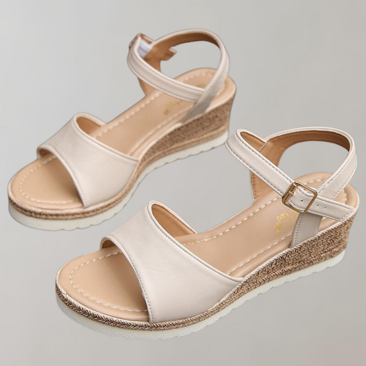 Women's casual summer wedge sandals with orthopaedic arch support and easy-to-adjust comfort straps.