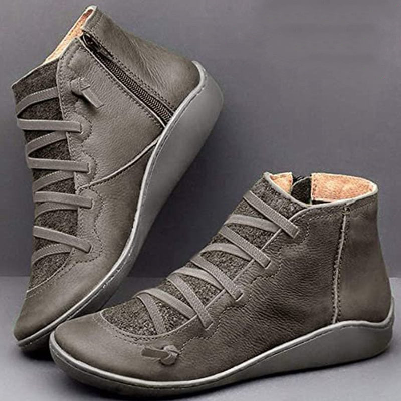 Supportive women's orthopedic ankle boots. Designed with arch and posture support for comfort, featuring a side zip.