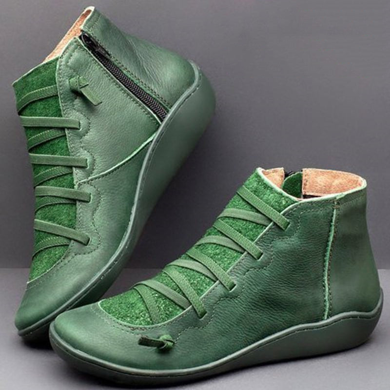 ComfortStep Luxe orthopedic women's ankle boots. PU leather, zip closure, arch support, and a comfortable flat heel.
