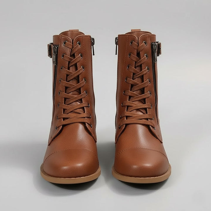 Women's orthopedic ankle boots with side zipper, black leather, comfortable and supportive for everyday wear.