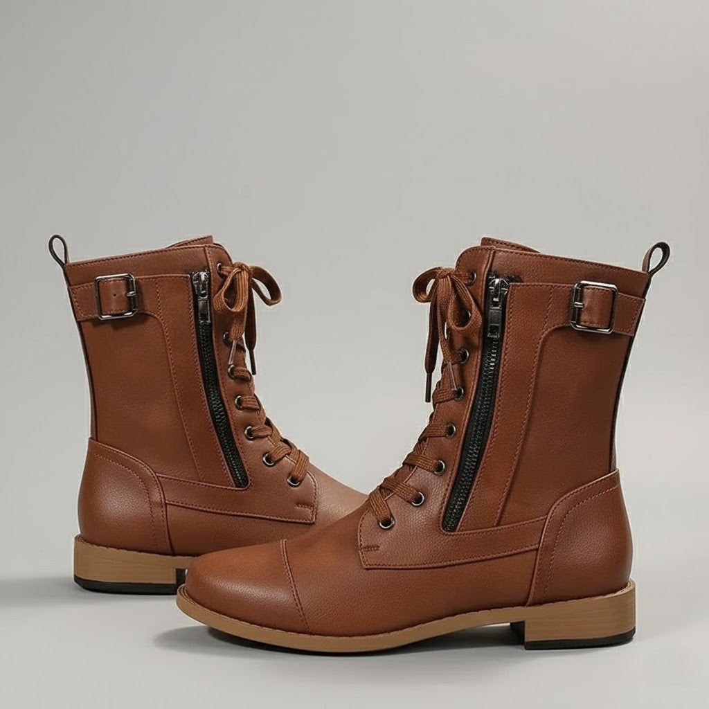 Close-up of women's orthopedic ankle boots featuring side zipper, arch support, and comfortable design.