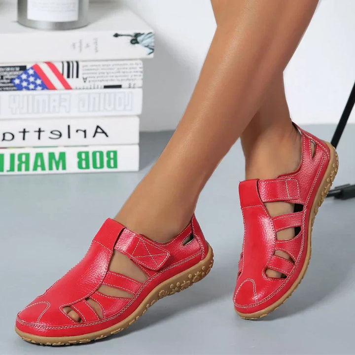 Stylish women's fashion sandals featuring orthopedic arch support and an adjustable strap.