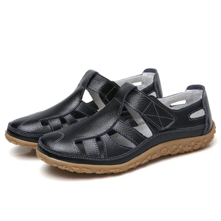 Orthopedic women's sandals, non-slip sole, arch support for safety and all-day comfort.