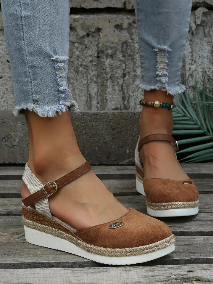 Close-up of the arch support feature in a women's stylish orthopedic sandal.