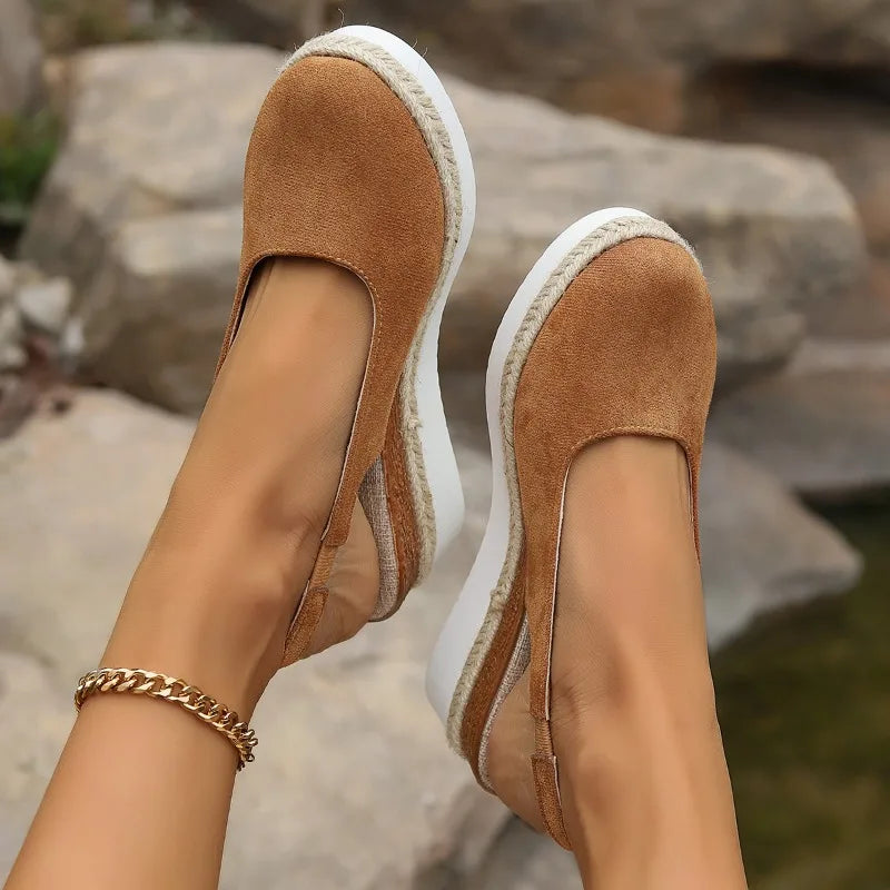 Sustainable women's slip-on loafers offering orthopedic comfort and casual style.
