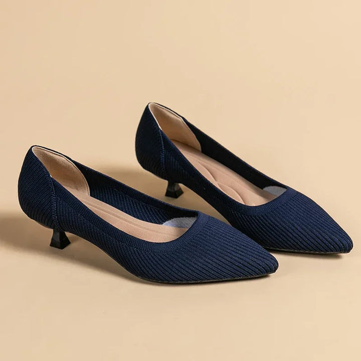 Women's heeled sandals with pointed toe, orthopedic comfort, and elegant design.