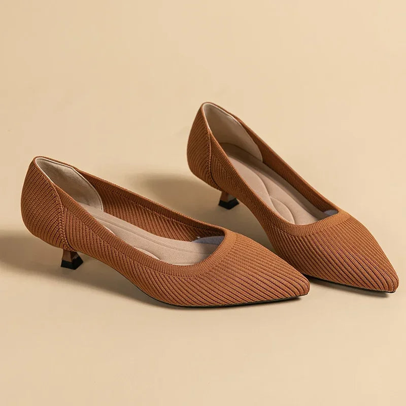 Fashionable orthopedic heeled sandals for women, offering foot support & comfort.