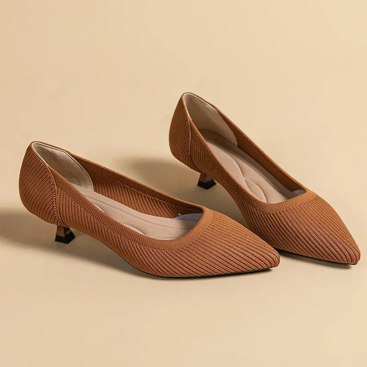 Fashionable orthopedic heeled sandals for women, offering foot support & comfort.