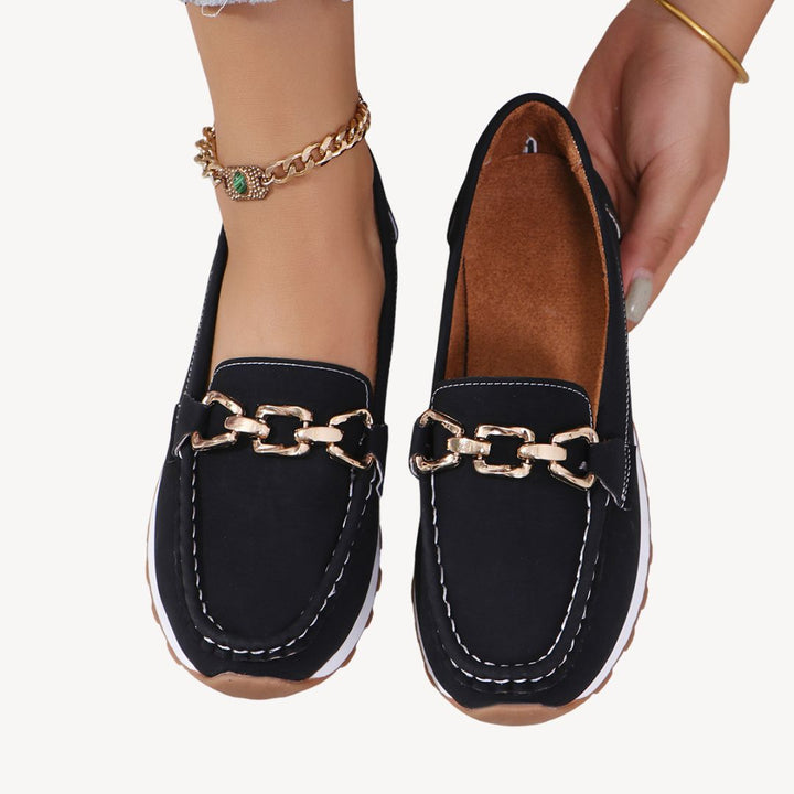 Easy slip-on women's orthopedic loafers with a chic chain, perfect for all-day comfortable walking.