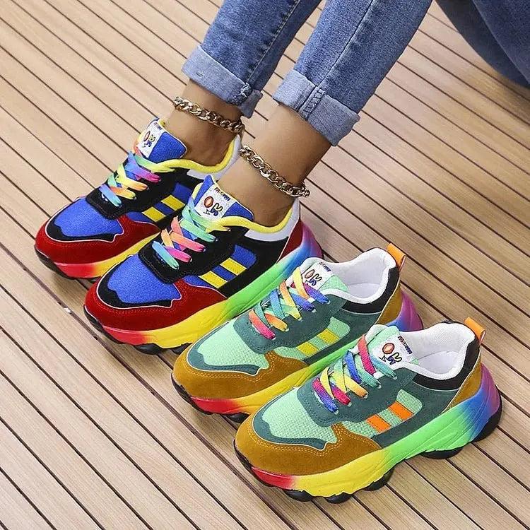 Stylish women's rainbow slip-on trainers, vibrant colors, lightweight design, offering casual comfort & wide fit.