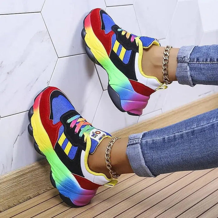 Lightweight women's activewear trainers, vibrant rainbow design, orthopedic comfort & arch support for exercise.