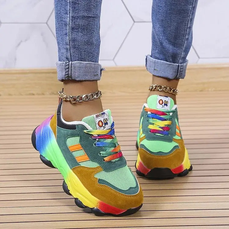 Comfortable women's rainbow trainers with orthopedic arch support, lightweight and breathable for active walking.