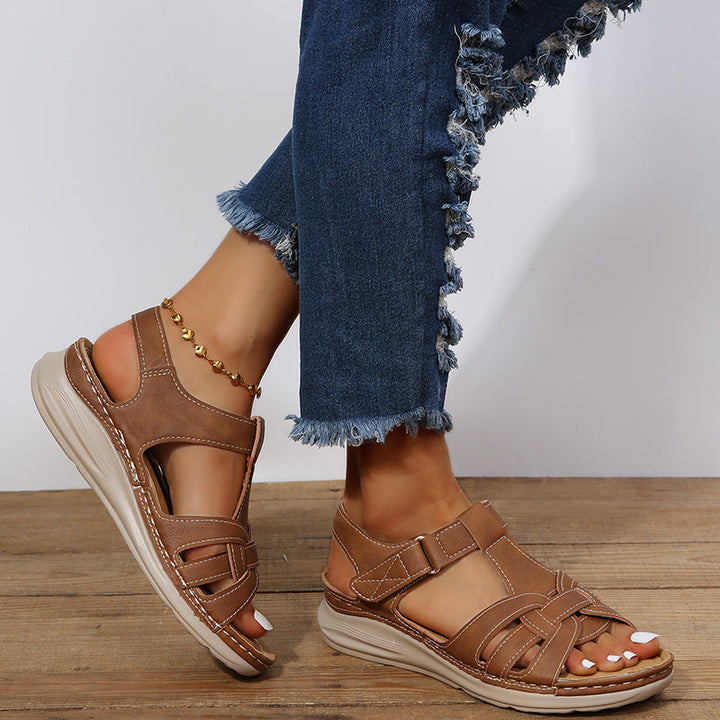 Ergonomic women's comfort sandals featuring supportive design & easy velcro adjustability for all-day wear.
