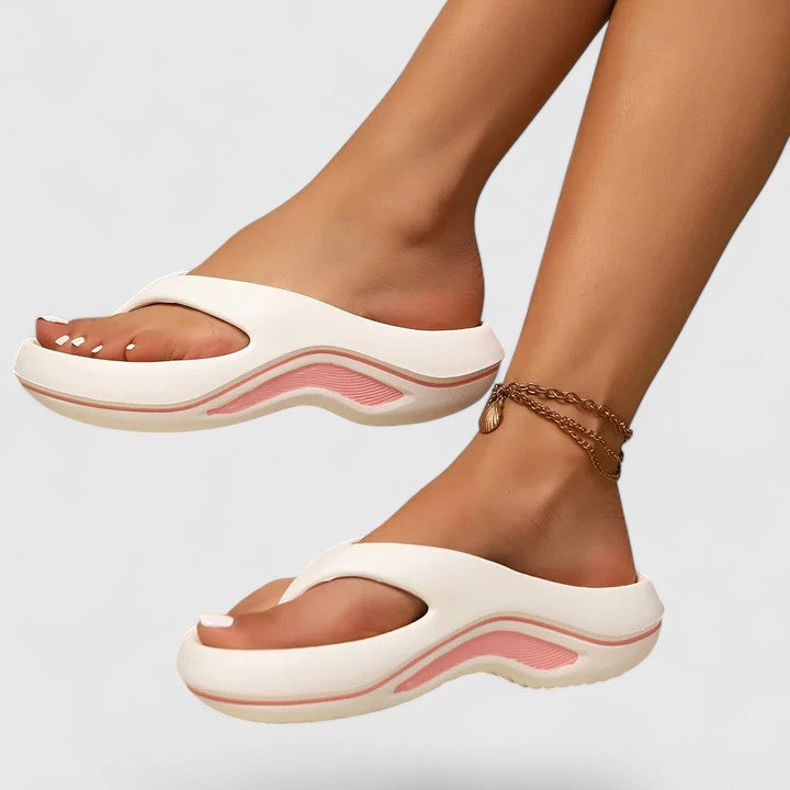 Lightweight women's slip-on orthopedic sandals with arch support, ideal for foot pain relief & casual wear.