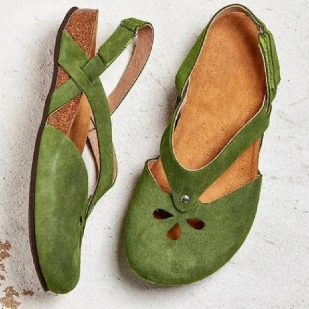 Women's orthopedic slingback sandals, cross-strap design for comfortable walking with arch support.