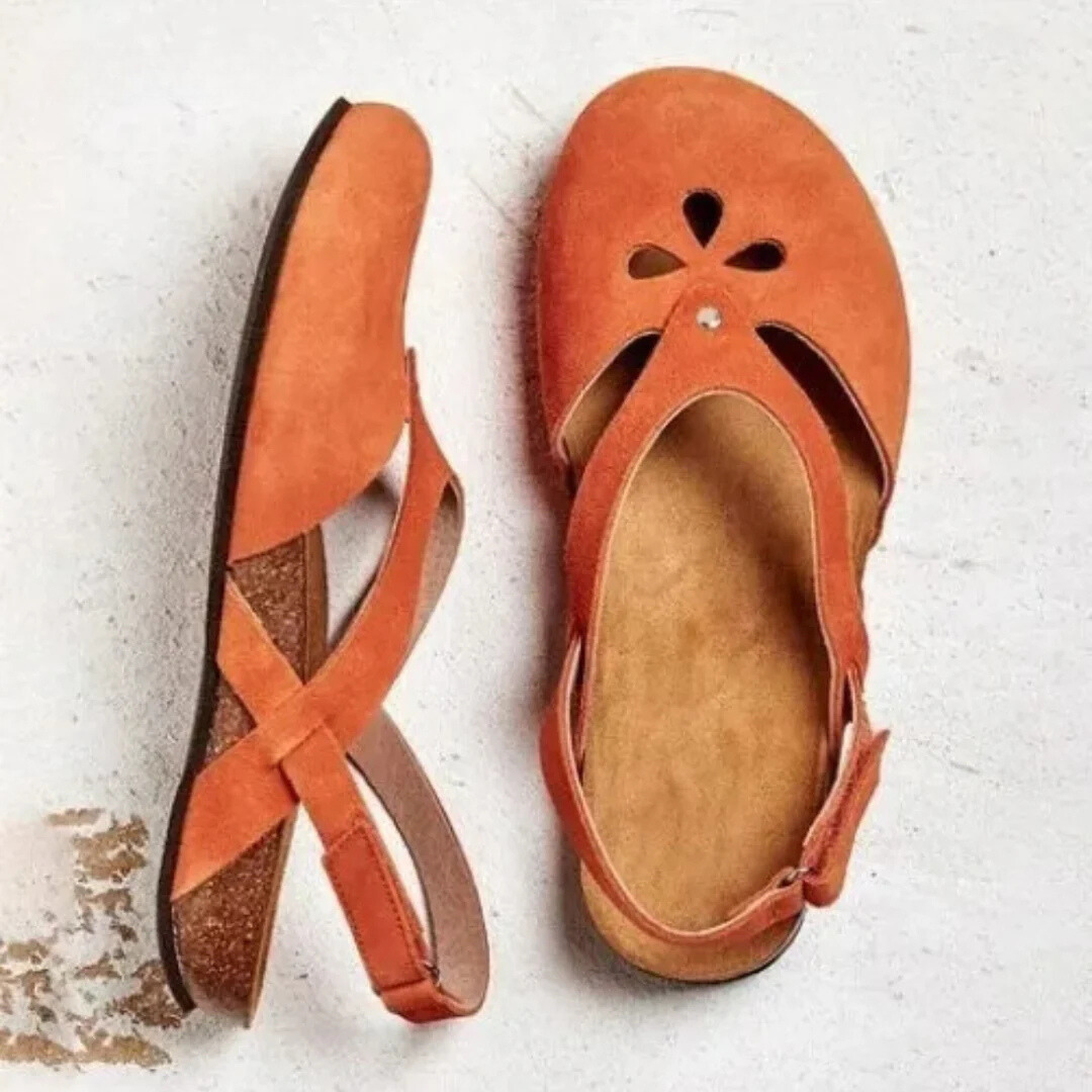 Supportive women's orthopedic slingback sandals, cross-strap for comfortable, healthy summer walking.
