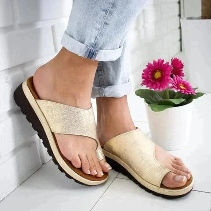Women's comfort footwear: slip-on orthopedic sandals with toe support, ideal for summer & pain relief.