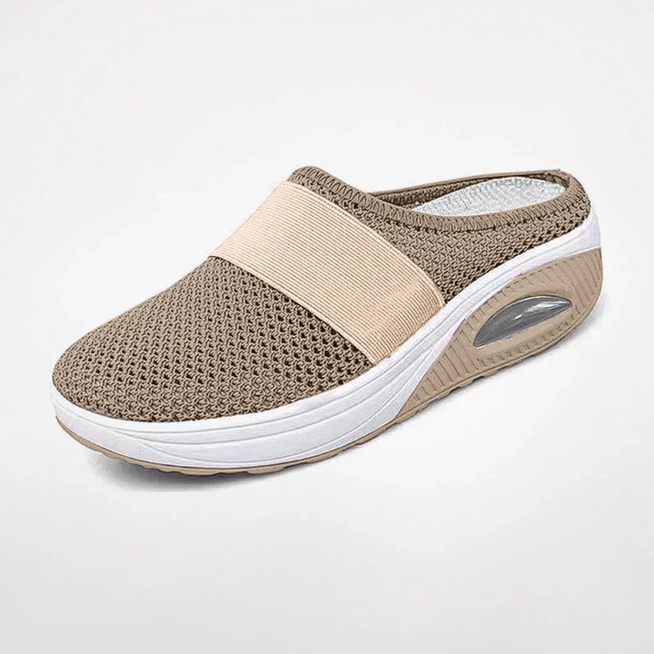 Stylish women's orthopedic slippers with strong arch support for ultimate comfort. Ideal casual footwear.