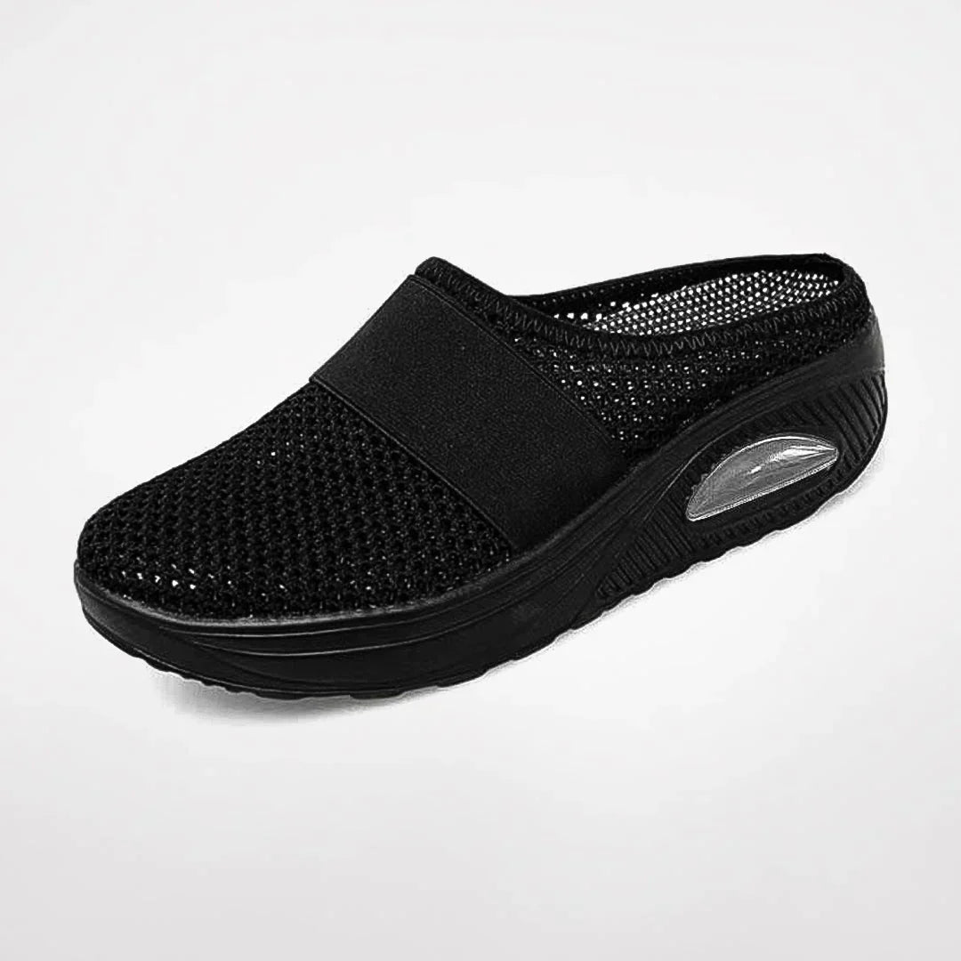 Plush women's orthopedic slippers, offering ergonomic arch support & cozy comfort for casual indoor wear.
